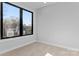 Bright bedroom with large windows and neutral carpet at 3437 Byrnes St, Charlotte, NC 28205