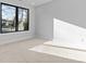 Bright bedroom with a large window offering natural light and views of the outside at 3437 Byrnes St, Charlotte, NC 28205