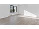 Well-lit bedroom with large window and contemporary flooring at 3437 Byrnes St, Charlotte, NC 28205
