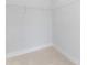 Bright walk-in closet, offering ample storage with a wire rack and neutral carpet at 3437 Byrnes St, Charlotte, NC 28205