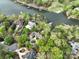 Aerial view highlighting the property's lakeside setting and manicured landscaping at 345 Porters Glen None, New London, NC 28127