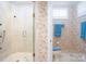 Bathroom with glass shower, toilet, and floral wallpaper at 345 Porters Glen None, New London, NC 28127