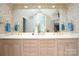 Elegant bathroom features a double vanity, floral wallpaper, and ample storage at 345 Porters Glen None, New London, NC 28127