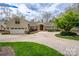 Circular driveway, mature trees, and attached garage highlight the exterior of this home at 345 Porters Glen None, New London, NC 28127