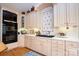 Well-equipped kitchen with white cabinets, modern appliances, and ample counter space for all your culinary needs at 345 Porters Glen None, New London, NC 28127