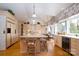 Spacious kitchen with center island, light wood cabinets, granite countertops and vaulted ceiling at 345 Porters Glen None, New London, NC 28127