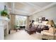 Cozy living room with fireplace, coffered ceiling, and comfortable leather seating at 345 Porters Glen None, New London, NC 28127