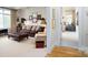 Spacious living room showcases neutral decor, comfortable seating, and access to other rooms at 345 Porters Glen None, New London, NC 28127