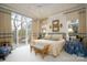 Inviting main bedroom with private balcony access, neutral tones, and stylish furnishings at 345 Porters Glen None, New London, NC 28127