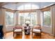 Cozy sitting area features hardwood floors, arched window, and neutral tones create a relaxing ambiance at 345 Porters Glen None, New London, NC 28127