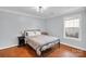 Bedroom with great natural light, neutral wall color, and hardwood flooring at 3701 Arthur St, Indian Trail, NC 28079