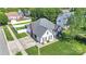 Charming white home featuring a driveway, garage and a well manicured lawn and fenced backyard at 3701 Arthur St, Indian Trail, NC 28079