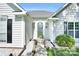 Welcoming home entrance with stylish walkway and freshly landscaped yard at 3701 Arthur St, Indian Trail, NC 28079