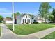Charming home with a well-manicured lawn and landscaping, showcasing curb appeal on a sunny day at 3701 Arthur St, Indian Trail, NC 28079