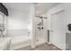 Stylish bathroom with a tub, shower, and subway tile, showcasing modern fixtures and bright, clean design at 4001 Brook Valley Run, Monroe, NC 28110