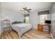 Bedroom featuring light wood floors and large windows at 4001 Brook Valley Run, Monroe, NC 28110