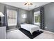 Bright bedroom with modern accents and curtains at 4001 Brook Valley Run, Monroe, NC 28110