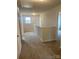 Upstairs hallway with neutral walls, plush carpet, and access to multiple rooms within the home at 436 Phifer Rd, Kings Mountain, NC 28086
