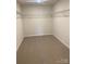 Spacious walk-in closet featuring carpet floors and wire shelving for optimal organization and storage solutions at 436 Phifer Rd, Kings Mountain, NC 28086