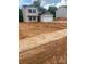 Charming two-story home features a one car garage and is located on a spacious lot at 438 Phifer Rd, Kings Mountain, NC 28086