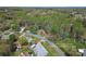 Spacious property with a defined boundary line showcases a cozy home surrounded by lush greenery and mature trees at 4896 Birch Cir, Hickory, NC 28602