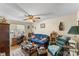 Cozy living room with a ceiling fan, comfortable seating, and a window at 4896 Birch Cir, Hickory, NC 28602
