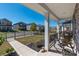 View from the front porch showcasing the neighborhood, manicured lawn, sidewalk, and curb appeal at 504 Cranford Dr, Pineville, NC 28134