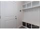 Well-organized mudroom with built-in storage, bench, hooks, and shelving at 504 Cranford Dr, Pineville, NC 28134