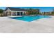 Large swimming pool featuring multiple lanes, a shallow end, and poolside seating for residents to relax and enjoy at 504 Cranford Dr, Pineville, NC 28134