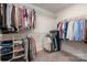 Spacious walk-in closet with ample shelving and hanging space for organized storage of clothes and accessories at 504 Cranford Dr, Pineville, NC 28134