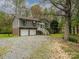Charming two-story home features a two-car garage and a traditional front entrance at 5601 Indian Brook Dr, Matthews, NC 28104