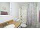 Traditional bathroom with tile surround, shower, and stylish countertop at 623 Roxboro Dr, Mount Gilead, NC 27306