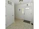 Bright entryway featuring tile flooring, a decorative front door, and convenient closet space at 623 Roxboro Dr, Mount Gilead, NC 27306