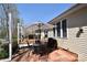 Outdoor patio with dining set, grill, and garden views at 623 Roxboro Dr, Mount Gilead, NC 27306