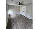 Large bedroom features plush carpeting and neutral paint at 6423 Town Hall Pl, Harrisburg, NC 28075