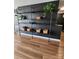 Open concept living room features custom shelving and modern design elements at 6423 Town Hall Pl, Harrisburg, NC 28075