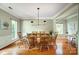 Formal dining room featuring hardwood floors and traditional decor at 6519 Summertree Ln, Charlotte, NC 28270