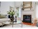 Close-up of living room showcasing fireplace detail and stylish center table at 6519 Summertree Ln, Charlotte, NC 28270