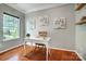 Bright office featuring hardwood floors and decor at 6519 Summertree Ln, Charlotte, NC 28270