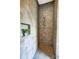 Modern tiled walk-in shower featuring a multi-setting showerhead and decorative plant niche at 6519 Summertree Ln, Charlotte, NC 28270