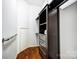Walk-in closet with shelves and drawers for organized storage at 6519 Summertree Ln, Charlotte, NC 28270