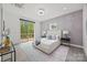 Open bedroom with a view, a sliding glass door, and decorative furnishings at 6548 Emerald Isle Dr, Sherrills Ford, NC 28673