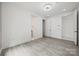Bright bedroom with hardwood floors and access to ensuite bathroom and closet space at 6548 Emerald Isle Dr, Sherrills Ford, NC 28673