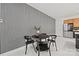 Modern dining area featuring stylish decor, sleek furniture, and a minimalist aesthetic at 6548 Emerald Isle Dr, Sherrills Ford, NC 28673