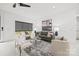 Bright, airy living room with modern furniture, minimalist decor, and ample natural light at 6548 Emerald Isle Dr, Sherrills Ford, NC 28673
