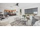 Bright, open-concept living area with modern furnishings and seamless flow to the kitchen at 6548 Emerald Isle Dr, Sherrills Ford, NC 28673
