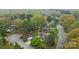 Aerial view of the property nestled in a residential area, displaying its location within the neighborhood at 6807 Stoney Ridge Rd, Matthews, NC 28104