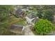 A lush backyard featuring a patio with an outdoor seating area and a well-maintained lawn at 6807 Stoney Ridge Rd, Matthews, NC 28104