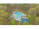 A community swimming pool surrounded by lounge chairs, offering a relaxing and recreational space at 6807 Stoney Ridge Rd, Matthews, NC 28104