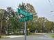 Street view featuring a corner of Wood and Page Street, with lush trees and visible street signs at 8124 Wood St, Mount Pleasant, NC 28124